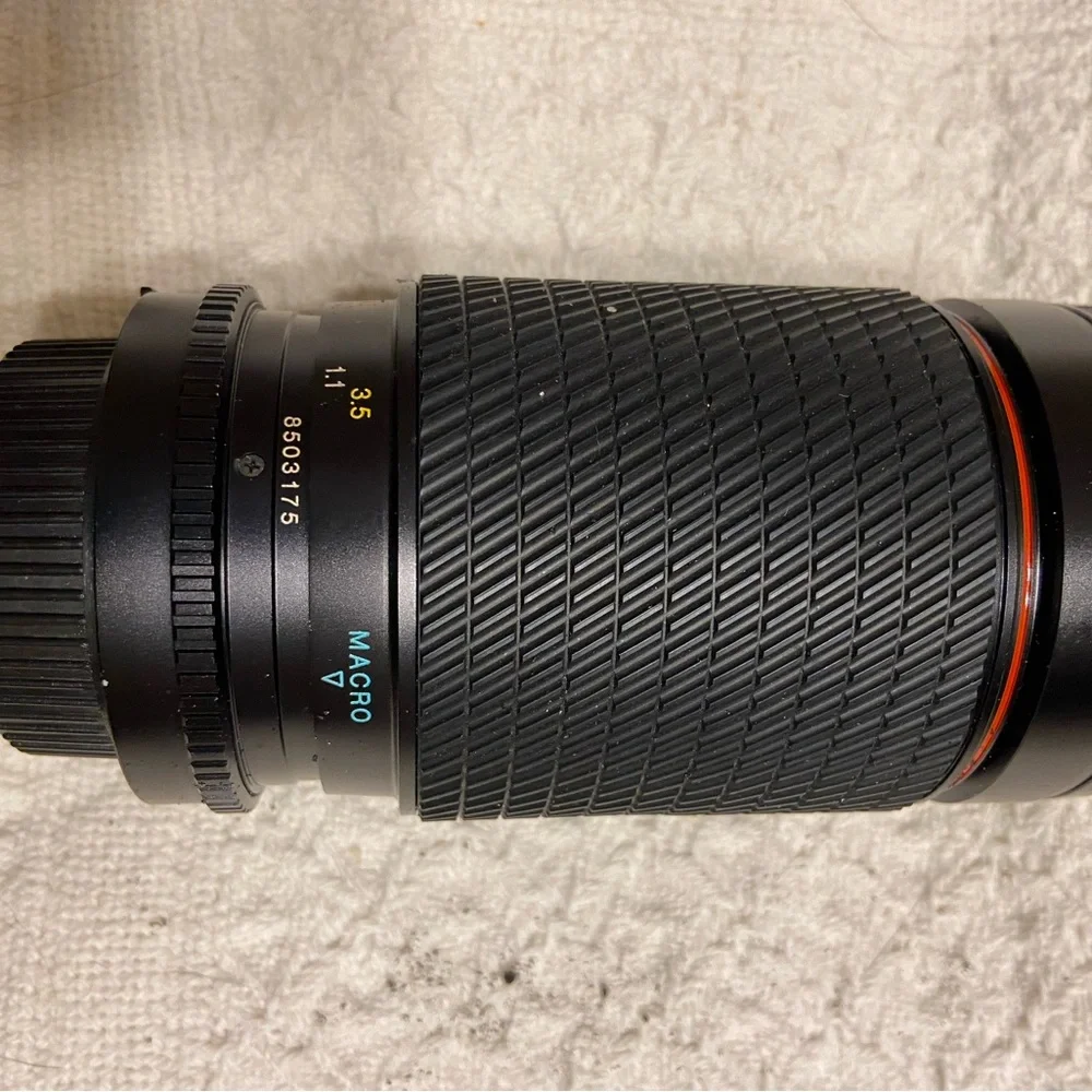 (2) Nikon F3 with Macro lens, light, zoom lens.